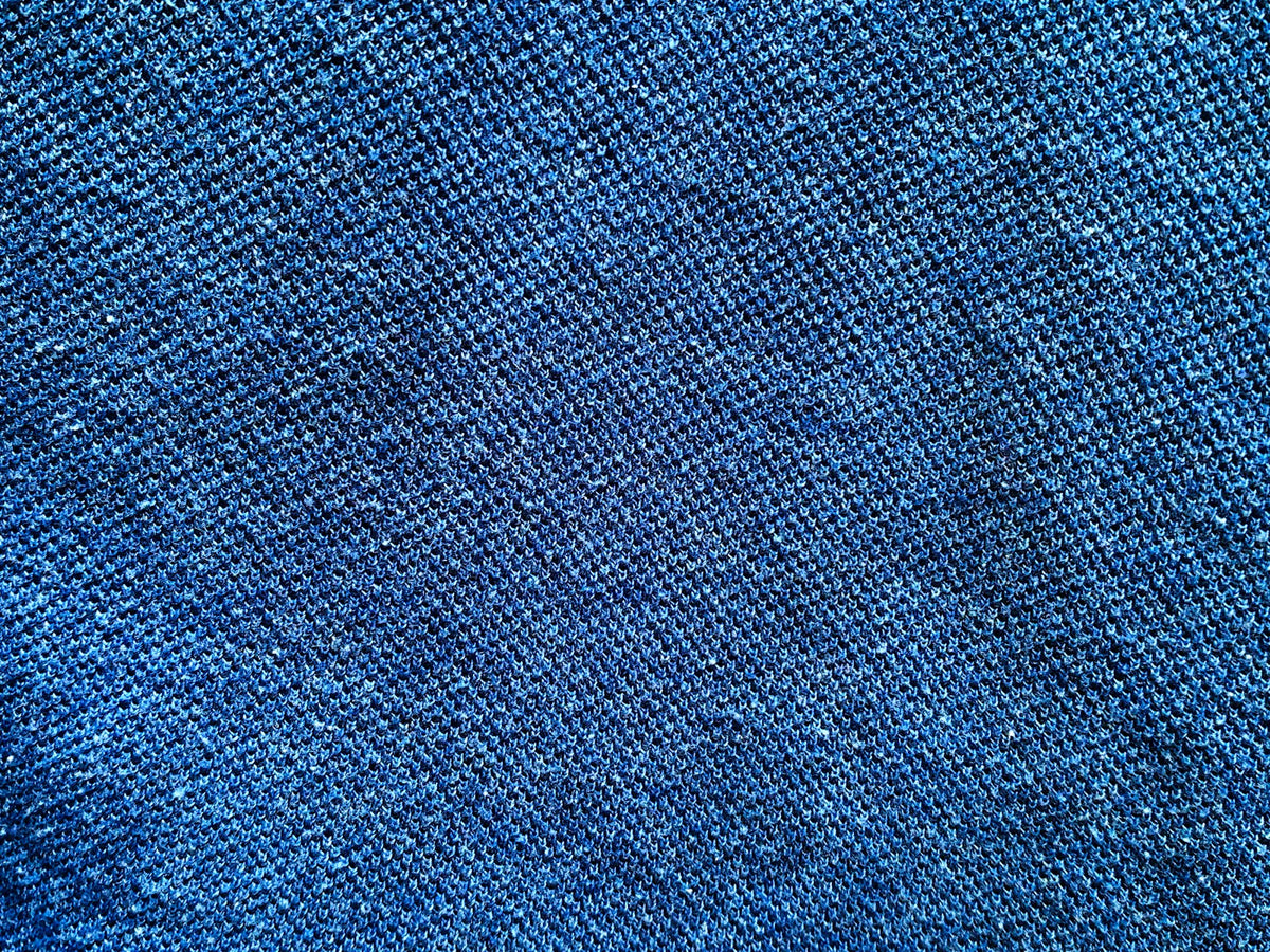 Close-up of soft blue woven fabric texture